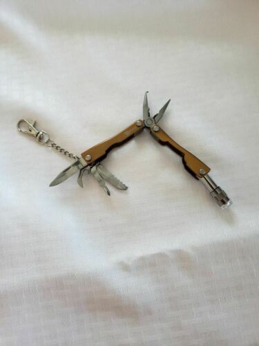 South Bend Fishing 10-Function Multi-Tool w/LED Flashlight
